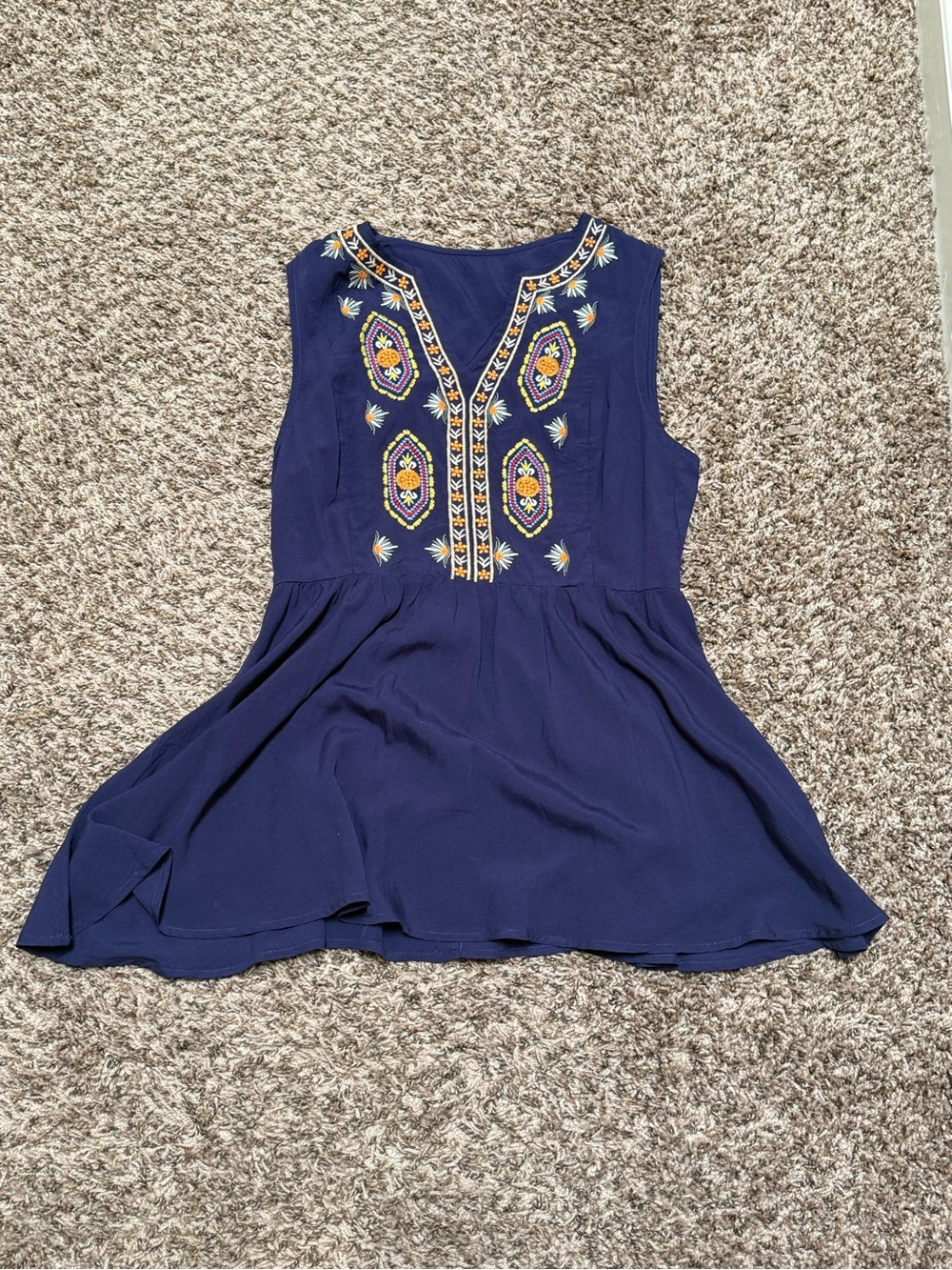 Navy Sleeveless Embroidered Peplum Top
